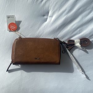 Brand new The Sak clutch. Tags on